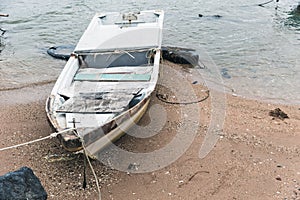 Old abandoned wreck ship unused small boat