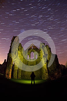 Old abbey ruins at night