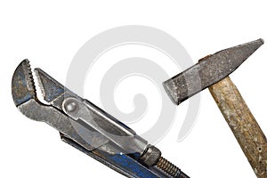 Old adjustable spanner and hammer