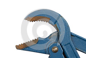 Old adjustable wrench with rust stains. Pipe wrench on a white background. Adjustable spanner close up with no shadows.