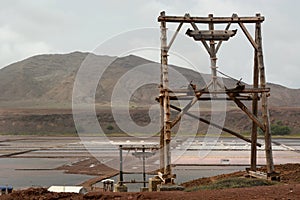 The old aerial tramway in salt evaporation ponds. Pedra de Lume. Sal island. Cape Verde photo