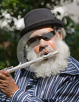 Old African American Musician Playing Flute