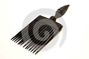 Old african sculptured comb photo
