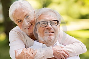 Portrait of happy senior couple at park