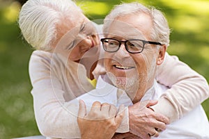 Portrait of happy senior couple at park