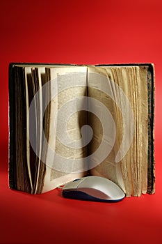 Old aged book and computer knowledge technology