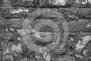 Old Aged brick wall. Grunge background. Bric. Stone Wall. Limestone. Rustic style. Black and white