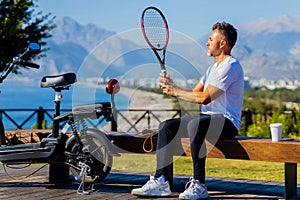 old-aged man good loking outdoors with eco scooter enjoying vacation