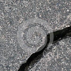 Old aged weathered cracked grey black tarmac texture pattern, large detailed damaged textured asphalt grungy background flat lay