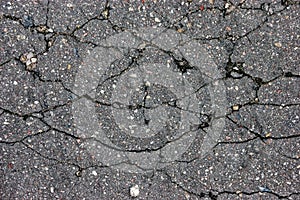 Old aged weathered cracked tarmac texture, large detailed damaged textured asphalt grungy background, horizontal grey, black rough