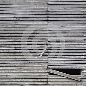 Old aged weathered natural grey damaged wooden farm shack wall texture, large detailed textured rustic grungy vertical background