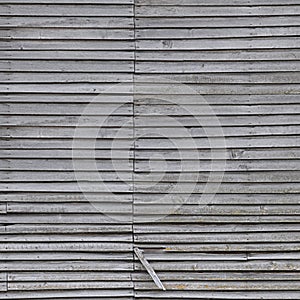 Old aged weathered natural grey damaged wooden farm shack wall texture, large detailed textured rustic grungy vertical background