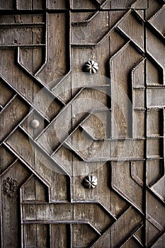 Old aged wooden door iron handcraft deco photo