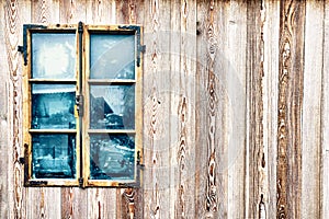Old and aged wooden window with lines and patternes