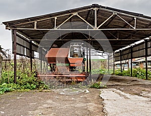 Old agricultural machinery. .Abandoned collective farm.