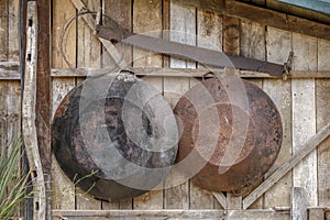 Old agricultural tools, hanging from the wall