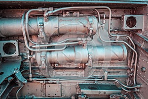 Old aircraft engine closeup with rusty decaying metal pipes and