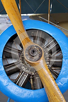 Old aircraft engine with wood propeller