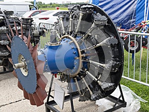 Old aircraft engine with wood propeller, vintage plane close up