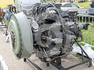 Old aircraft engine with wood propeller, vintage plane close up