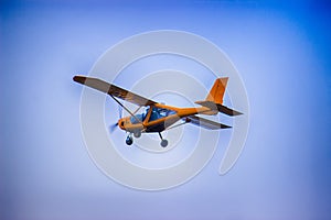 Old airplane against blue sky