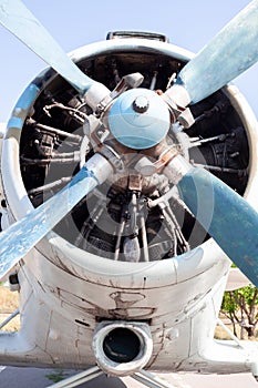 Old airplane engine close up. Radial engine of an propeller aircraft. Propellers on the nose of the aircraft