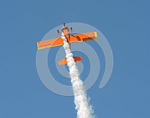 Old airplane performing stunt