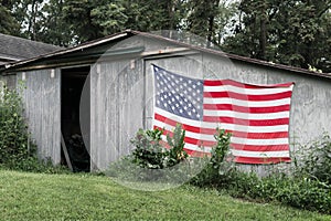 Old American Flag on a barn