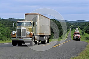 Old american truck driving on the highway