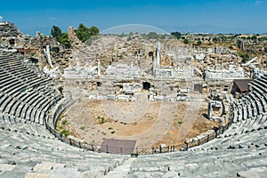 Old amphitheater in Side, Turkey. Panorama view photo. Ruins of ancient city