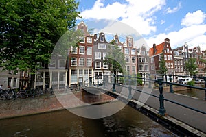 Old Amsterdam houses along canal
