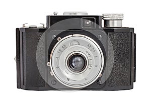 Old analog camera on film 35mm format isolated on a white background