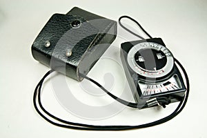 Old analog exposure meter with leather case