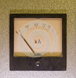 Old analog instrument - Ampere meter isolated on grey background