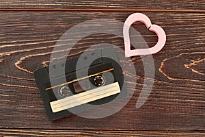 Old analogue cassette and pink heart.