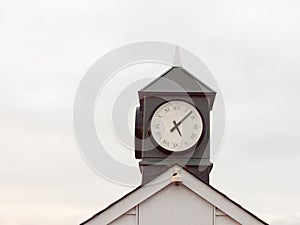 old analogue clock black and white tower of town tower building