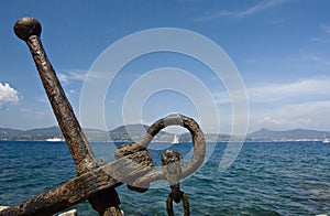 Old anchor with sea view