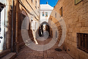 . An old and ancient alley paved with stone tiles, in the Jewish Quarter - in the Old City of Jerusalem - Israel