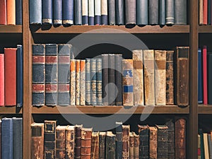 Old ancient Books on Bookshelf History book Library Vintage collection photo