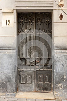 Old ancient metal door texture in european medieval style