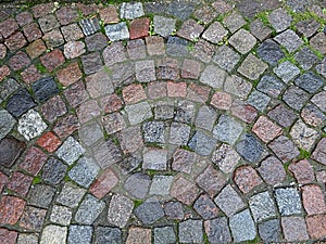 Old ancient paving stones mosaic pattern