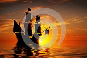 Old ancient pirate ship on peaceful ocean at sunset.