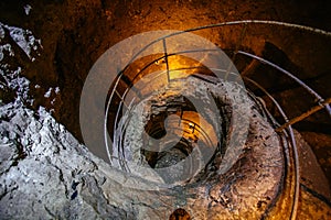 Old ancient spiral staircase in the well Tik Kuyu, in Chufut Kale, Bakhchisaray, Crimea Bakhchisarai Crimea photo