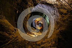 Old ancient spiral staircase in the well Tik Kuyu, in Chufut Kale, Bakhchisaray, Crimea Bakhchisarai Crimea photo