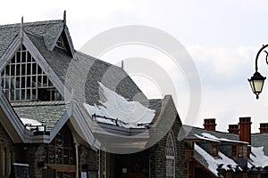 Old ancient vintage castle building rooftop covered with snow winter special