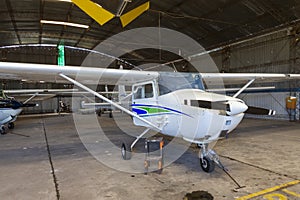 old angar with several airplanes ready for flight
