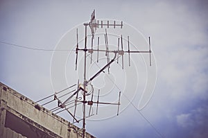 Old antenna with blue sky background