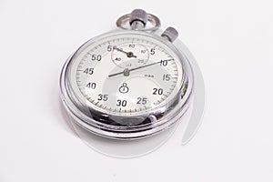 Old antiquary timer clock on the white background photo