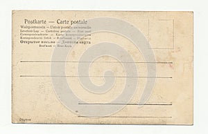 Old antique blank grungy postcard on white background photo