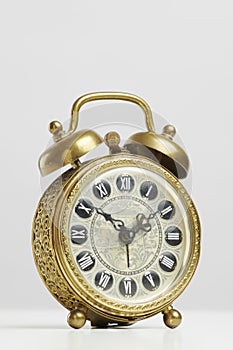 Old antique brass alarm clock